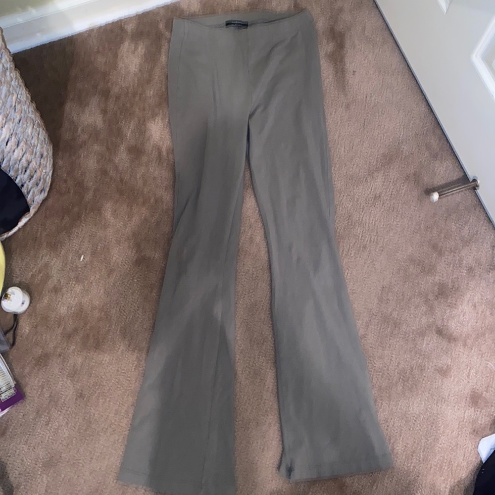 Green flared leggings